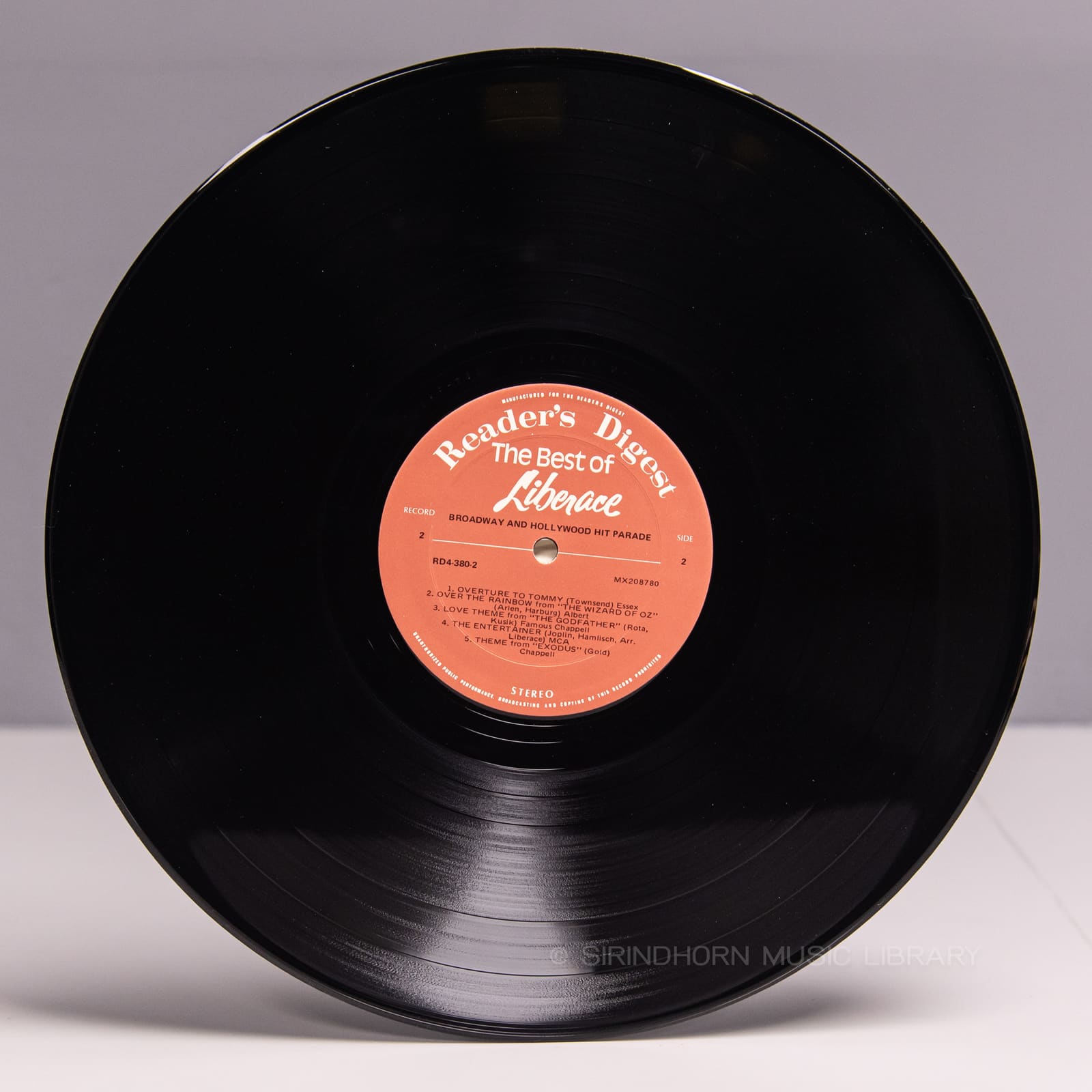 ป้ายแผ่นเสียง D — The best of Liberace
